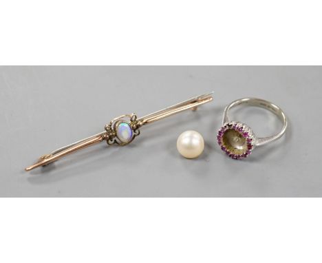 A modern Italian 18ct white gold, cultured pearl and ruby cluster set dress ring (pearl loose and missing one ruby), size N, 