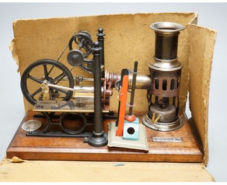 A boxed Ernst Plank hot air engine,25 cms wide x 16 cms high.