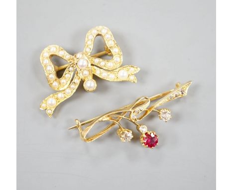 A yellow metal, ruby? and diamond set brooch, 36mm and a modern 9ct gold and split  pearl set ribbon bow brooch, gross 8.5 gr