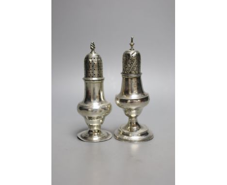 A George III silver pepperette, London, 1808, 13.9cm and one earlier silver pepperette with spiral finial, London, 1780.