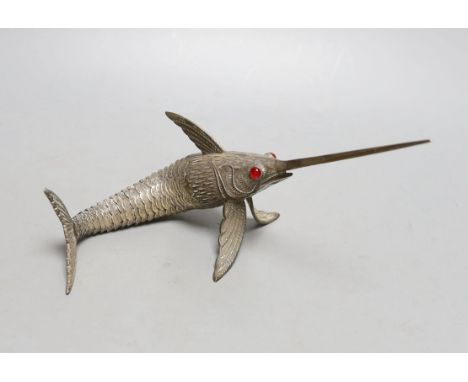 A 20th century Spanish articulated model of a swordfish, with red glass eyes, approx. 26.5cm, gross weight 118 grams.