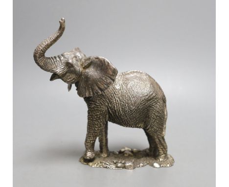 A modern miniature silver model of an elephant, maker CA, (filled), height 19cm.