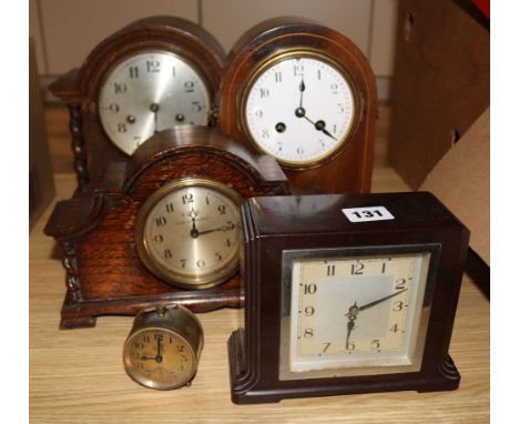 An Edwardian inlaid eight day mantel clock and three other clocks