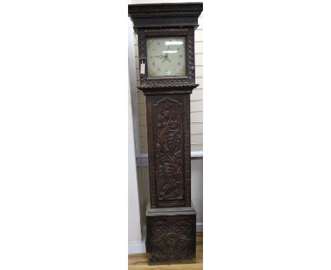 A carved oak thirty hour longcase clock with painted dial, 205cm