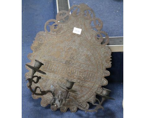 A Persian copper wall light
