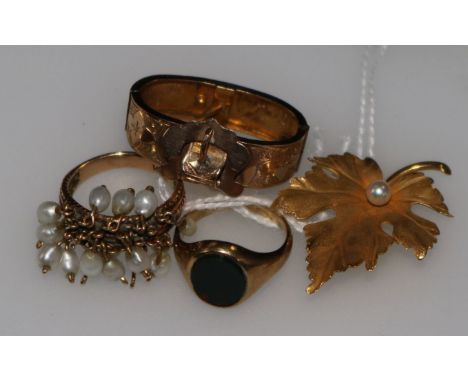 A 14ct gold and pearl ring, a signet ring with bloodstone matrix, a gold and pearl leaf brooch and a scarf clip.