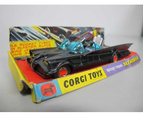 An Original Corgi No. 267 Batmobile. Red Bat Wheel Version, overall very good, appears complete and unbroken, working parts o