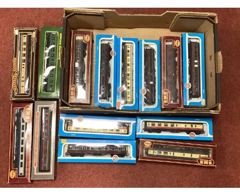 Fourteen Boxed OO Gauge British Coaches by Airfix, Mainline, including Dapol 60ft Composite BR Maroon.