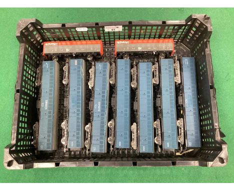 Seven OO Gauge Lima Syphon G Parcels Vans in BR Blue. Together with Two Bachmann Rail Freight VDA Vans.