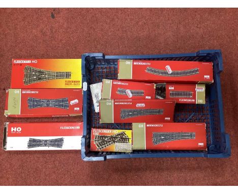 A Quantity of Fleischmann HO Scale Track, including Two Double Slips, Two Points and a Three Way Point, boxed.