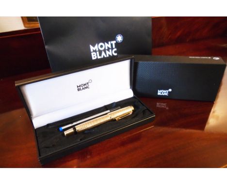 MONTBLANC 'BOHEME' ROLLERBALL PEN, with gold tone barrel, faux topaz jewel to clip, unused, as new, with box and refill. 