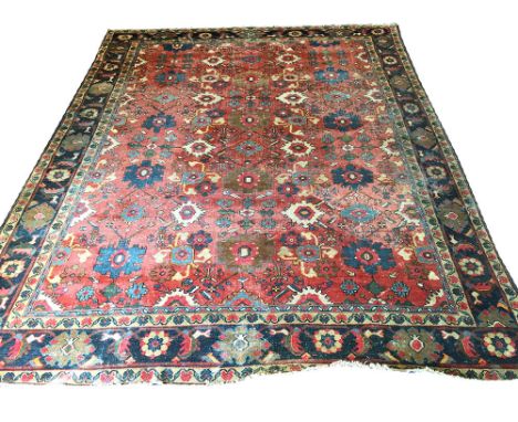 FINE ANTIQUE ZIEGLER MAHAL CARPET, 368cm x 288cm, all over palmette and vine design on a ruby field within corresponding guar