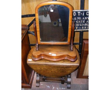 A small oak gate-leg table, together with a toilet mirror 