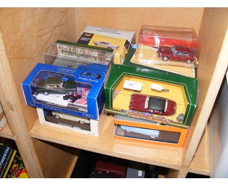 A selection of boxed die cast vehicles, including Corgi 