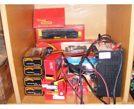 Assorted 00 gauge boxed carriages and goods wagons, together with a Hornby 00 gauge 2-6-4T engine, etc. 