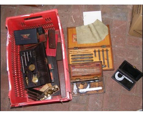 A quantity of vintage cased tools including micrometer 