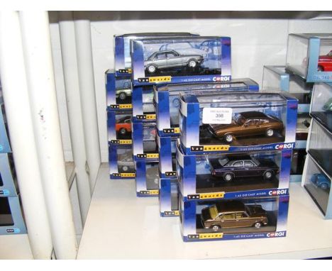 Fourteen Corgi Vanguards 1:43 scale die cast model vehicles 