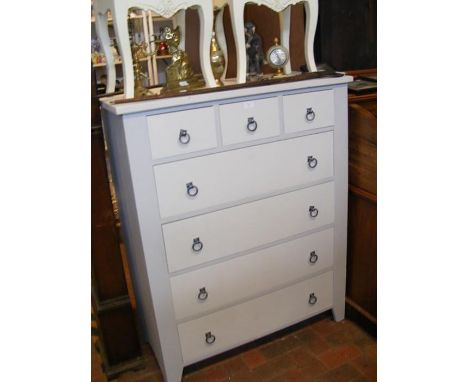 A painted chest of three short and four long drawers with ring handles - width 100cm 