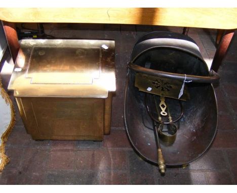 A copper coal scuttle with tools and a brass log bin 