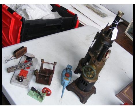 A live steam engine and one other, together with accessories