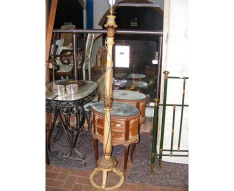 A pair of French style oval bedside tables, together with a standard lamp