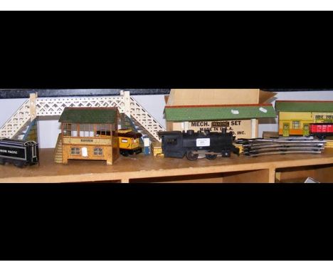 A Hornby 0 gauge station building, a Hornby footbridge, together with an 0 gauge engine and track, etc. 