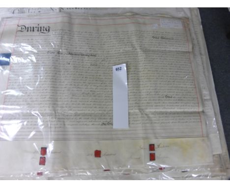 A collection of manuscript hand-written vellum documents documents which have been opened up from their usual folded state an