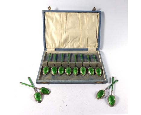 A set of twelve Swedish silver, parcel gilt and gillouche enamelled teaspoons, David Andersen    CONDITION REPORT:  Some loss
