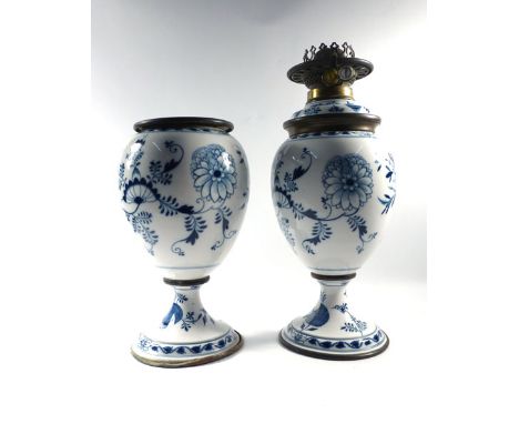 A pair of early 19th century blue and white table lamps of bulbous form, one deficient of reservoir and lighter, max. h. 43 c