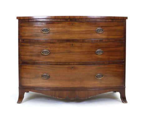 A 19th century mahogany bow fronted chest of three graduated drawers on splayed feet, w. 115 cm   CONDITION REPORT:  Shrinkag