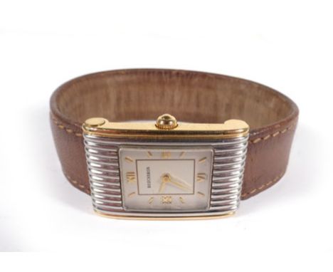 A 1990's ladies Boucheron 'Reflet' 18ct yellow gold and stainless steel wristwatch, the rectangular dial having gold baton an