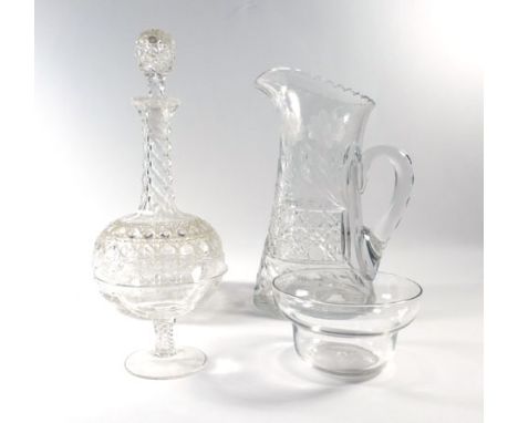 A group of 20th century glassware including a cut glass decanter and stopper, an etched water jug, a pair of etched glasses e