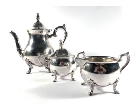 A silver plated three piece tea service of bulbous form   CONDITION REPORT:  Teapot handle with replacement insulators. Typic