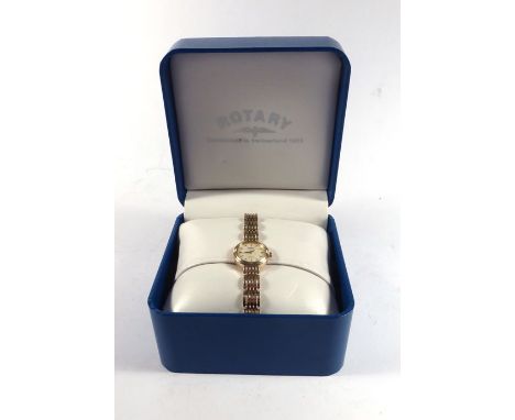 A 9ct yellow gold cased ladies wristwatch by Rotary, the circular mother of pearl dial with gold coloured baton numerals on a