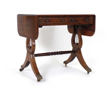 A Regency rosewood and brass mounted sofa table with two frieze drawers on lyre-shaped supports, w. 77.5 cm   CONDITION REPOR