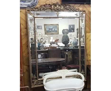 Large Fine Quality Continental Wall Mirror, the floral decorated upper finial over bevelled glass including a raised border, 
