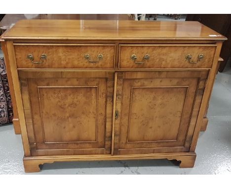 Yew Wood Sideboard, 2 apron drawers over 2 doors enclosing a shelf, 1.15m w x 90cm h