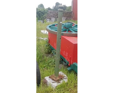 Cast Iron Gate Post, painted green (on a stone base)