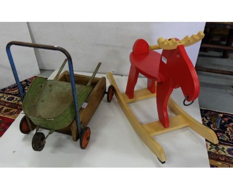 Small wooden Rocking Moose, painted red, a vintage Baby Walker and small tin Wheelbarrow (3)