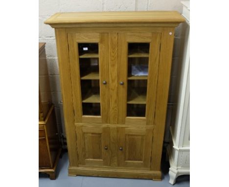 Reproduction light oak Side Cabinet with two glazed bevelled glass doors above two cupboard doors, 120cm w x 184cm h x 45cm d