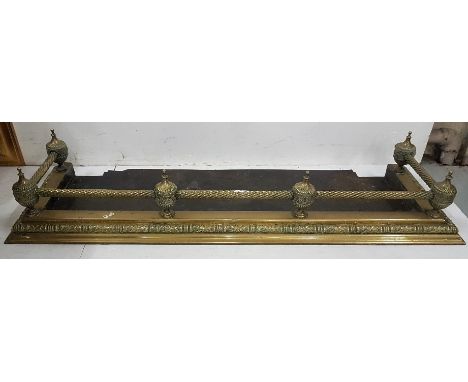 Good Heavy Late 19thC Brass Fire Kerb, with raised finials and vine impressions, metal shelf, 125cm w x 35cm deep