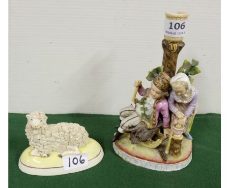 Two Dresden Figures – model of a ewe with her lamp and a candlestick with boy and girl at a figurative tree stump (chip to th