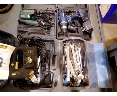 Mixed hand and power tools including an engraving set, jigsaw, drill and spanners. All electrical items in this lot have been