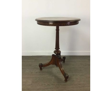 VICTORIAN WALNUT CIRCULAR TEA TABLE,the circular top on tapered fluted column to three outswept supports, 77cm high, 53cm dia