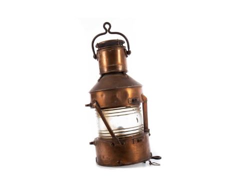 SHIP'S COPPER MAST HEAD LAMP,by Best &amp; Lloyd Ltd., anchor patt., with swing handle, ribbed clear glass shade and oil burn
