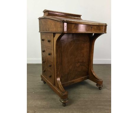 VICTORIAN BURR WALNUT DAVENPORT,with upper domed compartment over a hinged tooled red leather skiver, the base fitted with fo