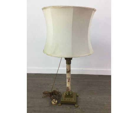 BRASS AND ONYX CORINTHIAN COLUMN LAMP,with clear glass reservoir, on square section base to four paw feet, 76cm high to bayon