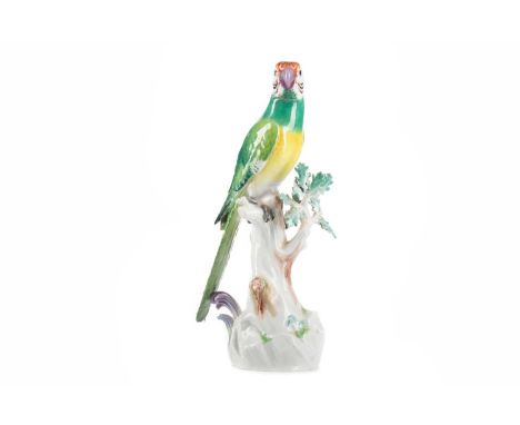 MEISSEN PARAKEET,late 19th/early 20th century, modelled perched on a branch, underglaze blue crossed swords mark and incised 
