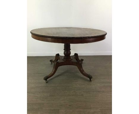 REGENCY MAHOGANY CIRCULAR BREAKFAST TABLE,in the manner of William Trotter, with oval beaded rim, raised on ring turned colum