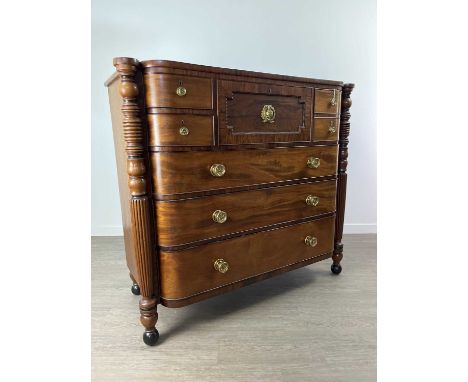 19TH CENTURY MAHOGANY BARREL-FRONTED CHEST OF DRAWERS,with ring turned columns flanking an arrangement of seven drawers, 118.